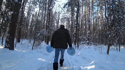 Man bottle winter forest Video stock 120643145