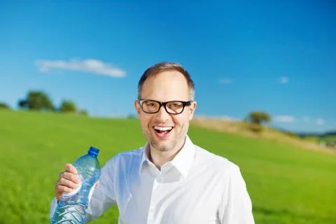Man with bottled water Stock Photos