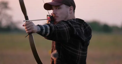 Man with bow Stock Footage 159479625