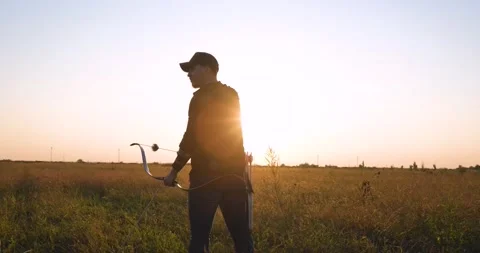 Man with bow Stock Footage 159480070