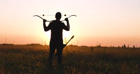 Man with bow Stock Footage 159480241