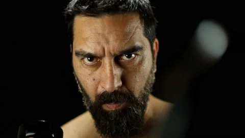 Man boxer training boxercise with dumbbells on black background. Stock Footage 157820682