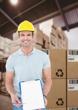 Man with boxes in warehouse Stock Photos