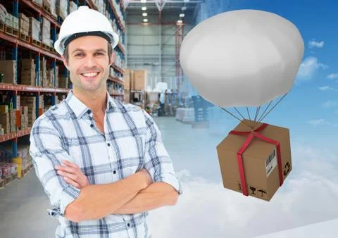 Man with boxes in warehouse, transition Foto stock