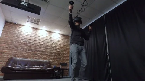 Man boxing in Virtual Reality goggles	 Stock Footage 73234957