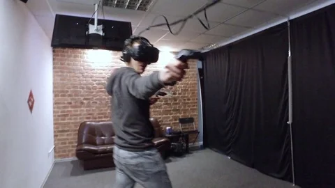 Man boxing in Virtual Reality goggles	 Video stock 73235050