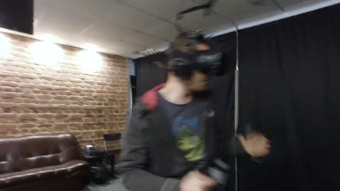 Man boxing in Virtual Reality goggles	 Stock Footage 73235074