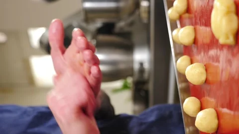 Man breadmaker employee in artisan bakery workshop preparing dough in circle Stock Footage 274339076