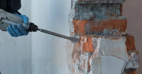 Man break brick wall in slow motion, vibration, wall trembles, brick destruction Stock Footage 123951186