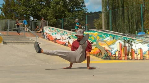 Man breakdancing in a skate park, slow motion Stock Footage 86461370