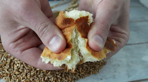 Man breaking off the bread Stock-Footage 62717964