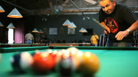 Man breaking a rack of 8 ball Stock Footage 452671