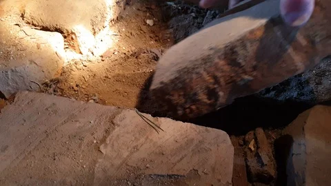 The man breaks bricks. Analysis of the floor of bricks. Brick work. Stock Footage 106003688