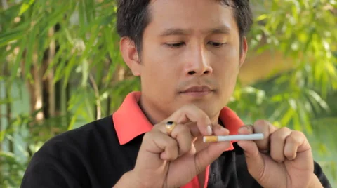 Man breaks a cigarette. Stock Footage 41309101