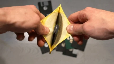 A man breaks diskette Stock Footage 121534913