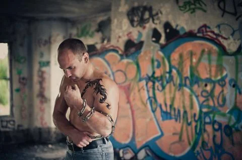Man breaks his chains in his hands 3553. Stock Photos