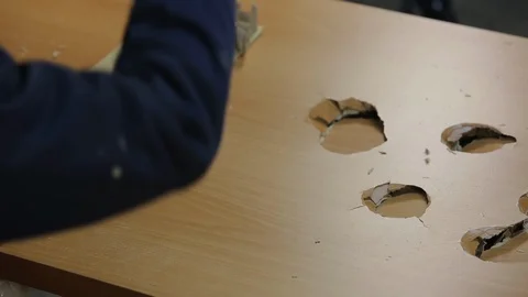 Man breaks interior door with large hammer, knocks with all his strength, dents Video stock 128391288