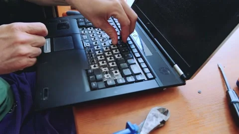 Man breaks the keys of a computer keyboard. Stock Footage 131972784