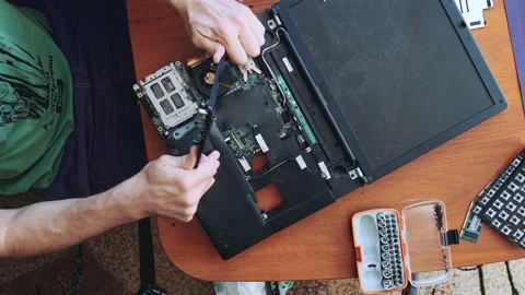 Man breaks a laptop keyboard. Stock Footage 131972937