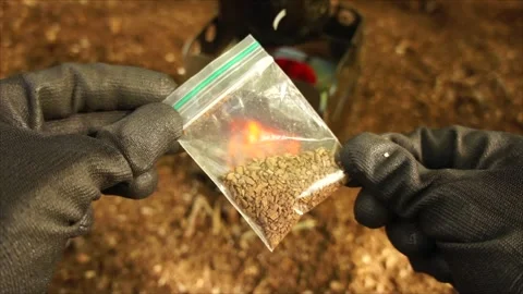 Man Brewing Coffee over Campfire. Coffee by the Campfire Stock Footage 306532926