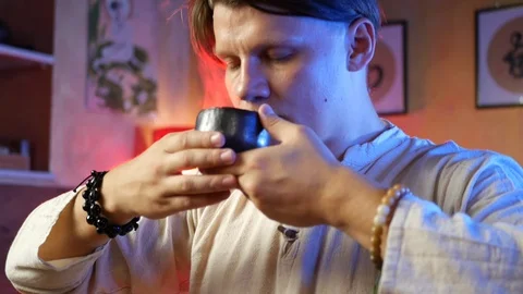 A man brews PU-erh tea according to traditional Chinese customs Stock Footage 114319752