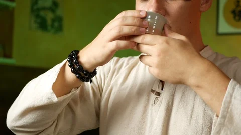 A man brews PU-erh tea according to traditional Chinese customs Stock Footage 114418294
