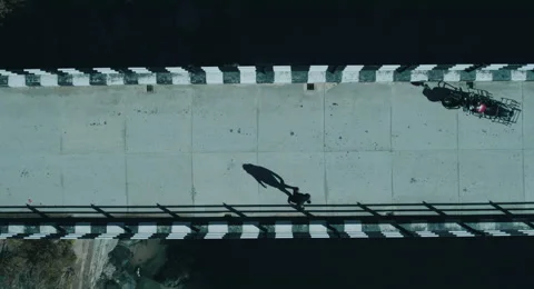 Man in the Bridge over a river Stock Footage 164708539