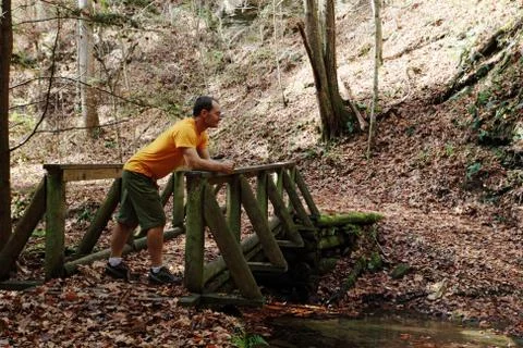 Man on bridge Stock Photos