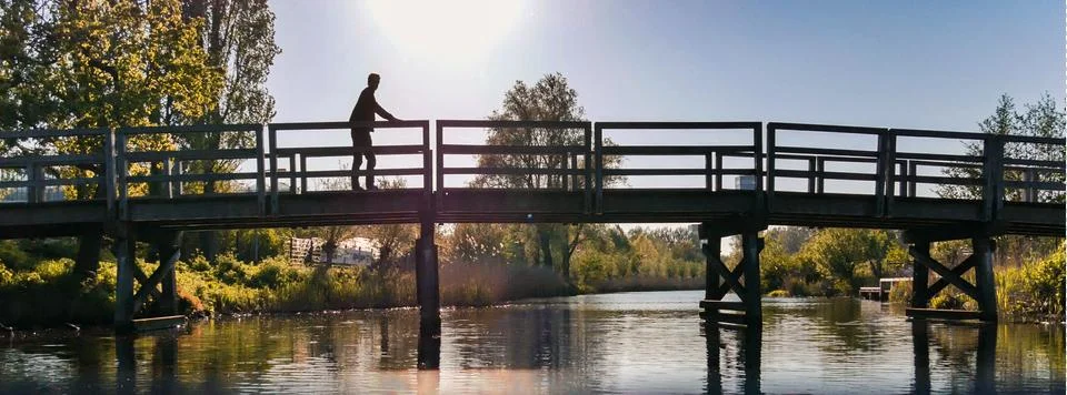 Man on the bridge Stock Photos
