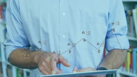 Man bringing finger close to tablet, initiating line chart overlay tapping Stock Footage 317369261