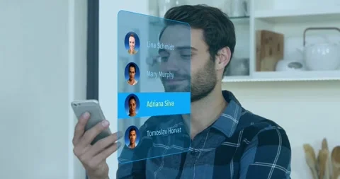 Man bringing smartphone to ear, showing tech menu before face, scrolling to 動画素材 328396357