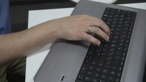 The man brings data into the computer and make analysis of information. Stock Footage 121301598