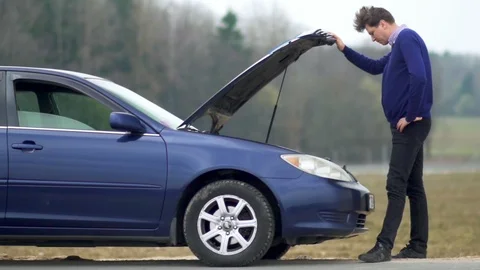 The man broke the car. Stock Footage 88649816