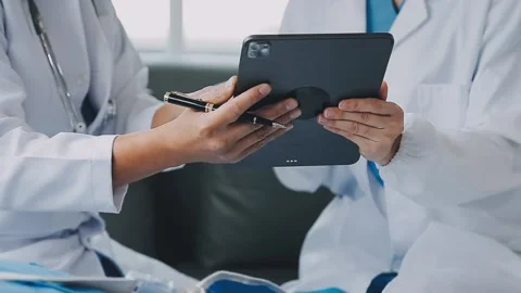 Man with broken arm in cast lying on bed in hospital. The emergency center .. Stock Footage 237356787