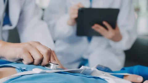 Man with broken arm in cast lying on bed in hospital. The emergency center .. Stock Footage 237356790