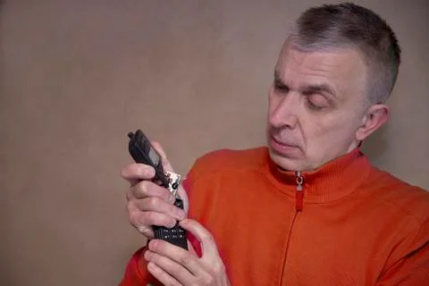 Man With Broken Mobile Phone Foto stock