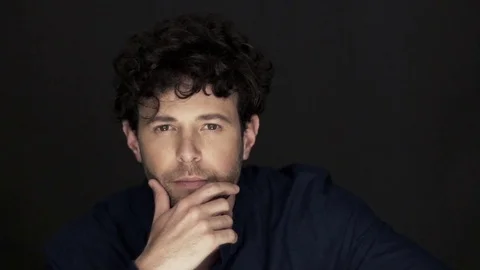 Man with brooding expression, portrait Stock Footage 75169490