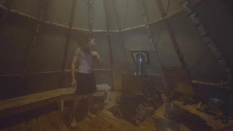 A man with a broom in a bathhouse Stock Footage 315779468