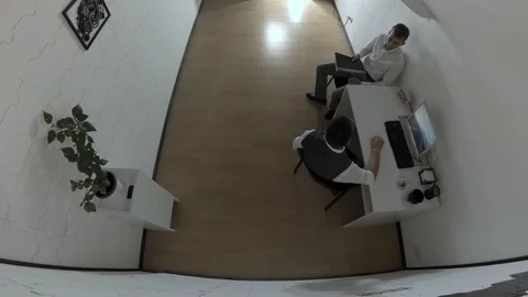 Man brought to colleague a folder with documents, security camera footage Stock Footage 111871314