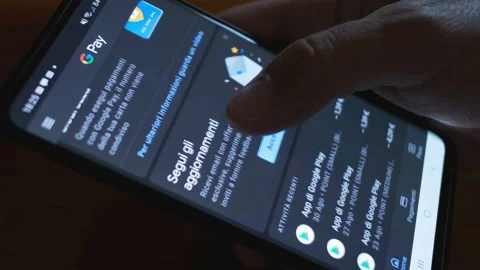 Man browsing google pay app on android smartphone,web e-commerce payment service Stock Footage 138736688