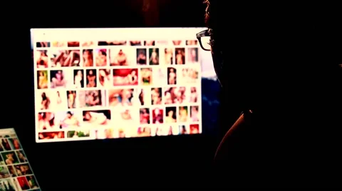 Man Browsing Internet Content About Nude Woman Video stock 67239244
