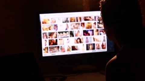 Man Browsing Internet Content About Nude Woman Video stock 67239254