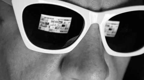 Man Browsing Internet Content, looking for picture Stock Footage 54386740