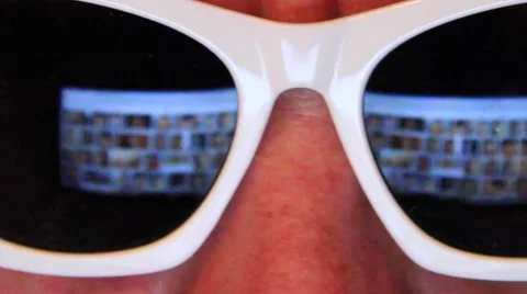 Man Browsing Internet Content, looking for picture Stock Footage 54391155