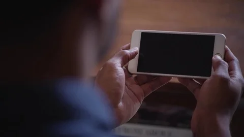 Man browsing internet on smart Phone Stock-Footage 83185154