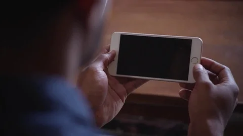 Man browsing internet on smart Phone Stock Footage 83185163