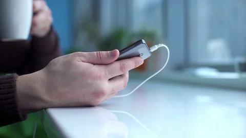 Man browsing internet on smartphone sitting at cafe Video stock 114752065