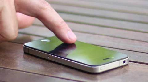 Man browsing iPhone smart phone 02 Video stock 39405773