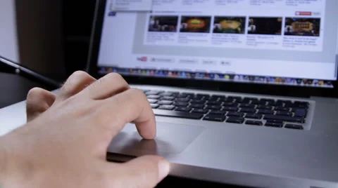 Man Browsing On A Laptop Using Touchpad, Technology, Media, Point Of View Tilt Video stock 41991958
