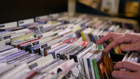 Man browsing records in the vinyl record store Video stock 71166930